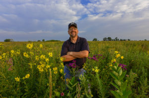 Pete Berthelsen in pollinator habitat, Conservation Blueprint